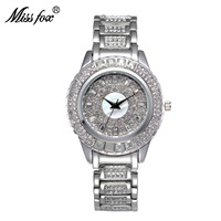 Vente directe d'usine de montres pour femmes de haute qualité, résistantes à l'eau, décontractées, avec bracelet en acier et diamants colorés