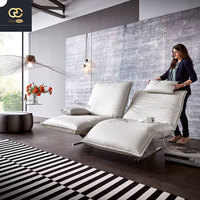 Le nouveau design de chaise italienne pour la villa - Meubles en cuir gris - une chaise inclinable créative, tout-en-un et luxueuse.
