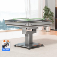Table de mahjong automatique de luxe avec roues pliantes en métal silencieuses pour le divertissement