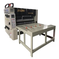 Machine d'impression flexographique à alimentation par chaîne à 4 couleurs avec rainureuse et découpeuse