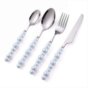 Ensemble de couverts raffinés en acier inoxydable avec manche en céramique perlée (cuillère et fourchette) - Product Image 1