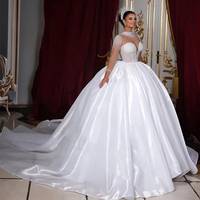 Robe de mariée de luxe à col montant, transparente, ornée de perles, à manches longues, style robe de bal
