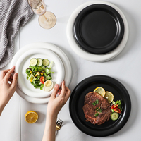 Vente en gros, assiettes épaisses de Style nordique, plat blanc noir en céramique, assiette à Steak en céramique, assiette à dîner en céramique