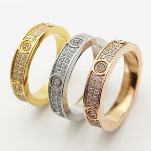 <b>Couple</b> <b>Ring</b> Stainless Steel 18K Gold Plated Zircon Safety Clasp Holiday Gift for Women Nickel Free Content - Product Image 1