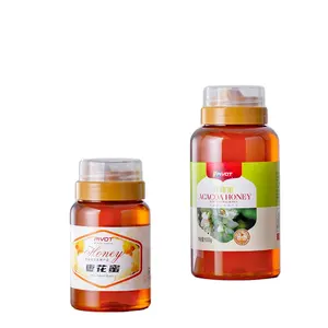Großhandels preis verfügbare Größen Zylinderform Lebensmittel qualität Kunststoff Honig glas Kunststoff Honig behälter Glas