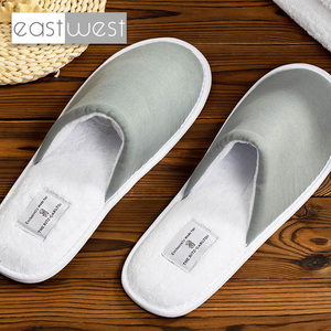 Pantuflas Desechables Blancas Unisex para Hotel, de Terciopelo Coral con Logotipo Personalizado, Suela de EVA, Marca EastWest, Hechas en China - Product Image 6