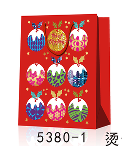 Bolsas de Regalo Navideñas de Papel Dorado al por Mayor, Bolsas de Compras Festivas con Estampado de Árbol, Ciervos y Adornos Navideños Coloridos - Product Image 1