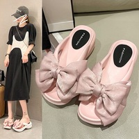 Nouvelles tongs tendance à la mode, à nœud surdimensionné, respirantes, légères, à semelle épaisse et douce, pour femmes, style bohème, printemps-été