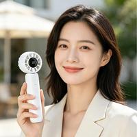 Vente en gros de ventilateurs portables à batterie électrique haute vitesse, rechargeables par USB, mini ventilateurs à main pour une utilisation en extérieur, en voiture, à l'hôtel