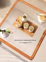 Table basse minimaliste de style Bauhaus-chinois du milieu du siècle, avec structure en acier inoxydable et plateau en verre, pour petits salons, sans assemblage