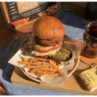 Papier d'emballage sulfurisé pour pain burger fast-food Emballage pour sandwich à la pâtisserie kraft Papier d'emballage pour aliments Papier d'emballage avec logo personnalisé