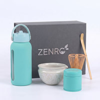 Bouteille à matcha portable personnalisée à faible MOQ, colorée, avec manchon de protection en silicone doux au toucher et couvercle à boucle de transport