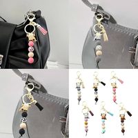 Porte-clés polyvalent en forme de vache des Highlands avec perles en silicone et pompon, idéal pour sacs, clés, voitures, cadeaux, porte-clés animal pour femmes et hommes