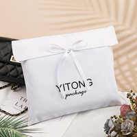Sac de rangement pliable en velours doux avec logo personnalisé, fermeture à nœud en ruban blanc, pochette enveloppe en velours pour vêtements