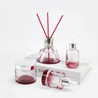 Ensemble cosmétique en verre transparent à fond rouge dégradé, avec bouchon argenté, diffuseur à bâtonnets, flacon compte-gouttes, pot à crème, emballage pour parfums d'intérieur et soins de la peau