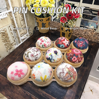 Vente en gros d'accessoires d'outils de couture DIY de couleur aléatoire de coussinets en bois pour aiguilles à coudre de style simple