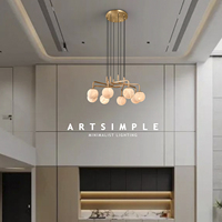 Lustre moderne en forme de sphère en albâtre naturel à branches multiples |   Luminaire suspendu LED en laiton doré réglable en hauteur pour salon