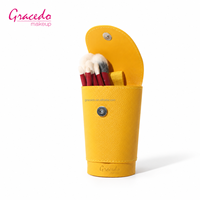 Ensemble de pinceaux de maquillage professionnel Gracedo 10 pièces, étui cylindrique en cuir jaune, poignée rouge, pinceau à raser, pinceau pour fond de teint et poudre