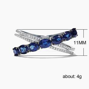 Anello creativo a forma di X con pietra blu per donna, design scintillante intarsiato, gioielli alla moda per tutti i giorni - Product Image 5