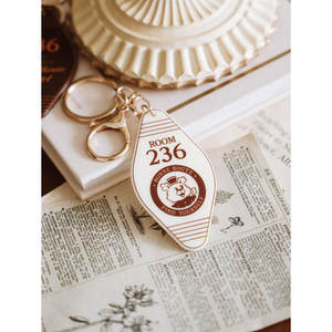 Portachiavi da viaggio in avorio a forma di conchiglia unica accessorio pratico ed elegante per serrature da viaggio - Product Image 1