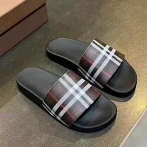Sandales de plage noires de luxe en cuir véritable de haute qualité pour hommes et femmes, pantoufles décontractées d'extérieur, vente en gros directe usine - Product Image 1