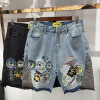 Jean tendance américain avec logo brodé Godsped, style vintage délavé, mode masculine