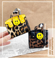 Nouvelle mini pochette multifonctionnelle en PVC effet peau de serpent, porte-monnaie, pendentif, porte-clés, étui pour écouteurs Bluetooth, super légère