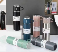 Bouteille isotherme à double paroi en acier inoxydable 304, faible MOQ usine, avec deux couvercles, ensemble cadeau
