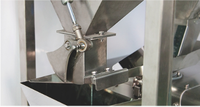 Machine de pesage linéaire automatique haute vitesse à une tête multifonctionnelle pour l'étiquetage, l'emballage et le remplissage de films, sacs plastiques et feuilles d'aluminium de qualité alimentaire