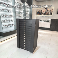 Stock d'usine disponible : 288 paires de présentoirs à lunettes modernes en cuir PU noir, finition brillante, haute qualité, pour cinéma et optique.