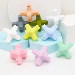 Tùy chỉnh BPA miễn phí trẻ sơ sinh mọc răng quà tặng hình chữ thập Silicone đồ chơi trẻ em Teether