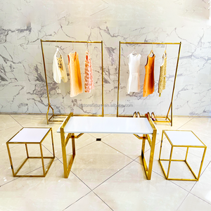 Soportes de <span class=keywords><strong>ropa</strong></span> y estantes para zapatos, muebles de exhibición de <span class=keywords><strong>tienda</strong></span> de lencería, mesas de anidación doradas, baratos, precio de fábrica - Product Image 1