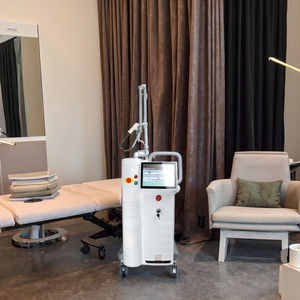 Máquina láser de CO2 fraccional vertical NdYAG para estiramiento vaginal, eliminación de cicatrices de acné y arrugas, rejuvenecimiento de la piel 3D/4D, refrigeración por aire - Product Image 1