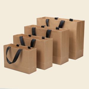 Bolsas de papel kraft con logotipo personalizado para tiendas de ropa, publicidad empresarial, bolsas de papel para regalos al por mayor - Product Image 1