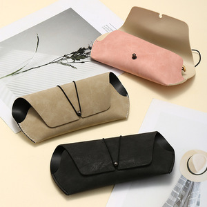 Vente en gros de haute qualité Sac <span class=keywords><strong>souple</strong></span> <span class=keywords><strong>Étui</strong></span> en cuir pour <span class=keywords><strong>lunettes</strong></span> Convient à la plupart des femmes Logo personnalisé - Product Image 1