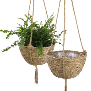 Panier suspendu en fibres végétales rond fait à la main, pot de fleurs mural avec corde pour une utilisation en intérieur et en extérieur - Product Image 1