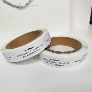 Étiquettes d'avertissement autocollantes rondes en rouleau de papier anti-contrefaçon pour emballages professionnels - Product Image 1