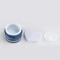 Flacon en verre opale modulaire bleu brillant de 40 ml pour soins du visage minimalistes et pot en verre opale de 50 g pour cosmétiques