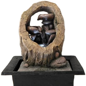 Fontaine d'eau de table d'intérieur électrique à cascade de fleurs et de pierres - Product Image 1