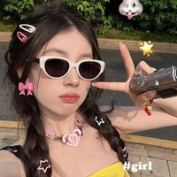 Lunettes de soleil œil-de-chat rétro chic pour femmes, style urbain haut de gamme, effet amincissant, protection UV400, tendance 2024