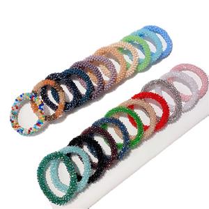 Accessoires de cheveux élastiques tendance pour femmes et filles : élastiques à cheveux, anneaux en caoutchouc, cordes, bracelets avec perles et strass - Product Image 1