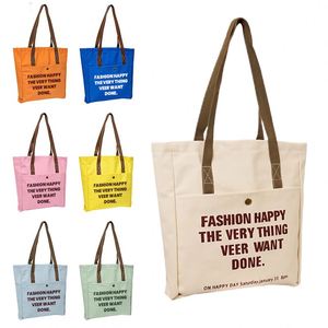 Sac fourre-tout en toile crème avec poche avant, bouton-pression et impression de slogan pour étudiants, courses quotidiennes et travail - Product Image 3