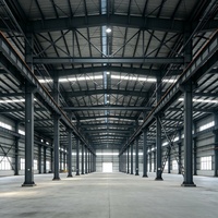 Bâtiment d'entrepôt en acier YUHUI sur mesure, garantie 5 ans, conception de modèle 3D pour le stockage de matières premières, applications industrielles en usine