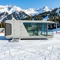 Maison conteneur capsule spatiale au design moderne pour hôtels et immeubles de bureaux