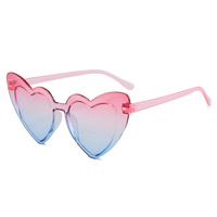 Lunettes de soleil en forme de cœur pour femmes, grande monture, mode, mignonnes, sexy, rétro, œil de chat, vintage, protection solaire, lunettes unisexes