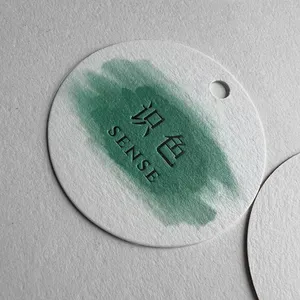 Étiquettes de balançoire personnalisées rondes Étiquettes d'étiquettes de vêtements Étiquette d'artisanat en papier spécial blanc avec impression verte