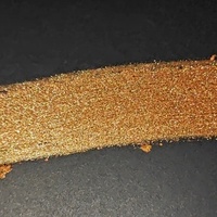 Pigment perlé à fines particules pour revêtement en poudre, disponible en vrac