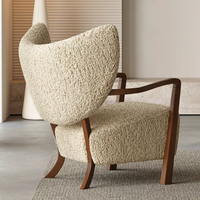 Fauteuil lounge Woolf, couleur marron thé au lait, style rétro français, bois massif, fauteuil individuel en fourrure d'agneau, style minimaliste moderne