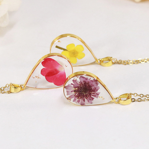 Collier <span class=keywords><strong>fleur</strong></span> du mois <span class=keywords><strong>de</strong></span> <span class=keywords><strong>naissance</strong></span> IVY 2024 avec <span class=keywords><strong>fleur</strong></span> séchée véritable en résine et chaîne en acier inoxydable pour mariages et cadeaux - Product Image 5