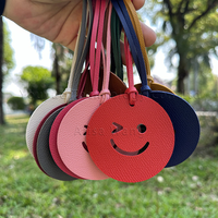 Porte-clés en cuir PU coloré et durable, pendentif de sac mignon en forme de sourire porte-bonheur pour clés de voiture pour femmes